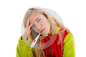 Blond girl with thermometer and flu cold in pyjama
