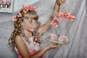 Blond girl with white flowers in her hair