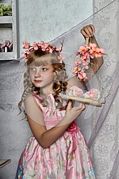 Blond girl with white flowers in her hair