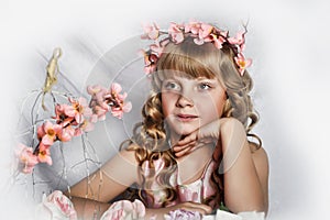 Blond girl with white flowers in her hair