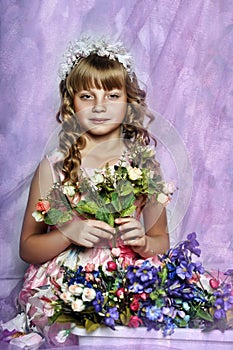 Blond girl with white flowers in her hair