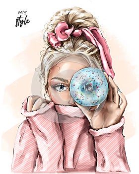 Blond hair girl holding doughnut near her eye. Fashion girl with beautiful hairstyle. Pretty young woman. photo