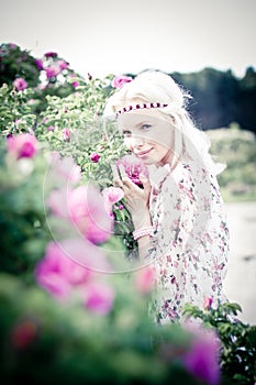Blond hair woman with pink roses