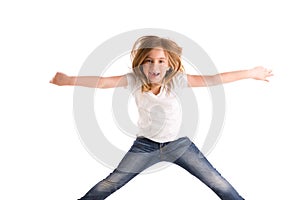 Blond kid girl indented jumping high wind on hair