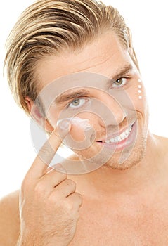 Blond man creme face