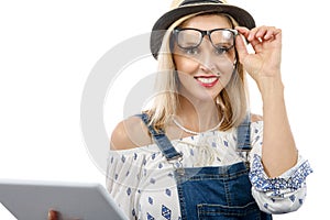 Blond middle-aged woman with tablet