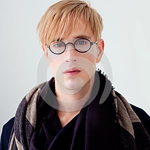 Blond modern student man with nerd glasses