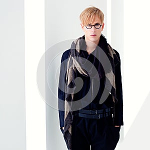 Blond modern student man with nerd glasses