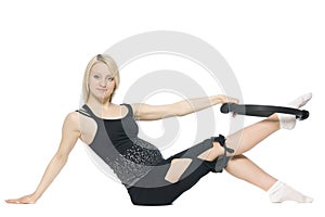 Blond pregnant woman doing pilates