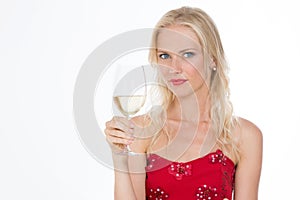 Blond pretty girl with a glass of white wine on closeup