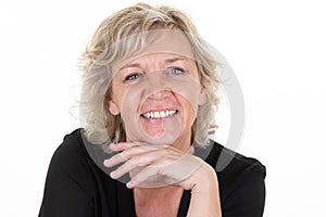 Blond pretty senior woman smiling on isolated white background