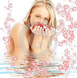 Blond with red and white rose petals and flowers i