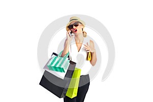Blond shopaholic woman bags and smartphone photo