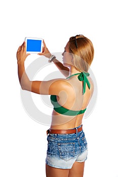 Blond short jeans woman selfie tablet photo