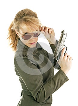 Blond soldier girl with gun