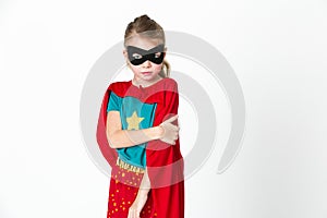 Blond supergirl with black mask and red cape posing in front of white background