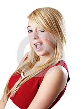 Blond teen girl winking