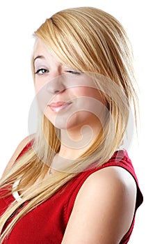 Blond teen girl winking