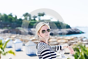 Blond woman in aviator sunglasses