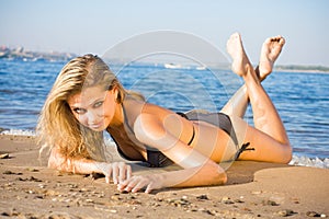 blond woman on a beach