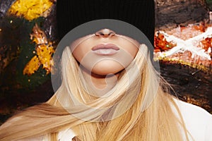 Blond woman with a blindfold