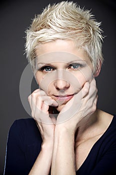 Blond woman with blue contact lenses