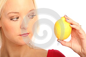 Blond woman with a citron