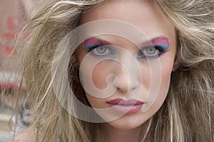 Blond woman with dramatic eyes