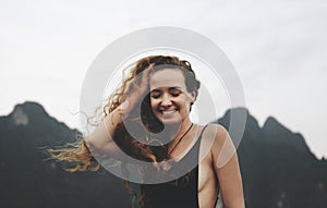 Blond woman enjoying the summer breeze