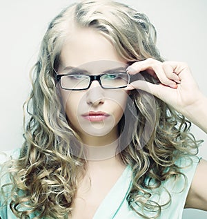 Blond woman with glasses