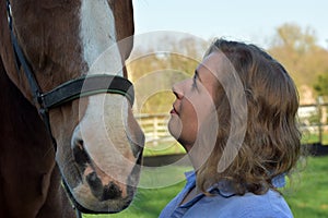 Blond woman and  her  horse