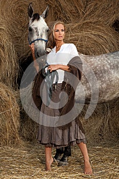 Blond woman with horse