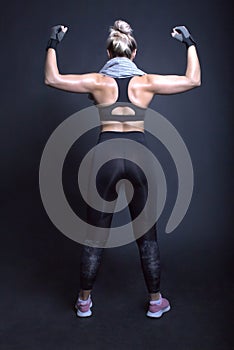 Blond woman muscular back fitness