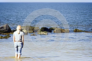 Blond woman at sea