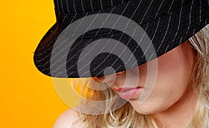 Blond woman with trendy hat