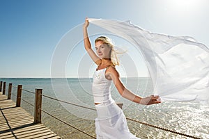Blond woman with white shawl