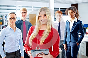 Blond young businesswoman multi ethnic team