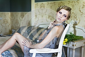 Blonde beauty in a vintage room