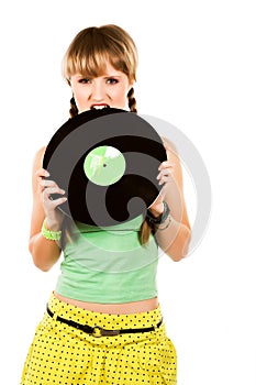 Blonde biting a vinyl record