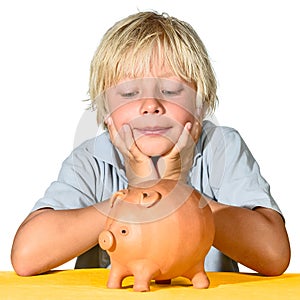 Blonde boy with piggy bank