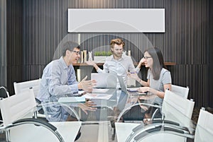 Blonde business man does not understand native language in meeting room