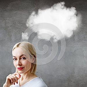 Blonde business woman with empty cloud over head.