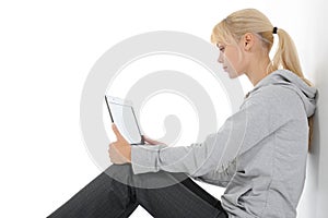 Blonde with a computer on his lap