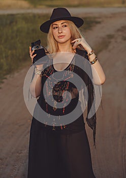 Blonde European attractive lady in Boho style