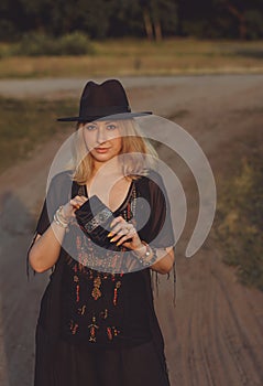 Blonde European attractive lady in Boho style