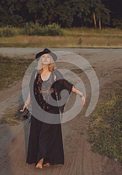 Blonde European attractive lady in Boho style