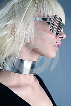 Blonde fashion futuristic silver glasses girl