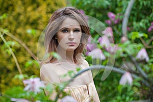 Blonde fashion woman with long hair and make-up  on white background, studio beauty portrait