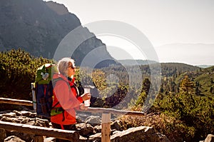 Young blonde caucasian hiker high in mountains, Slovakia