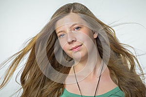 Blonde girl with blown hair